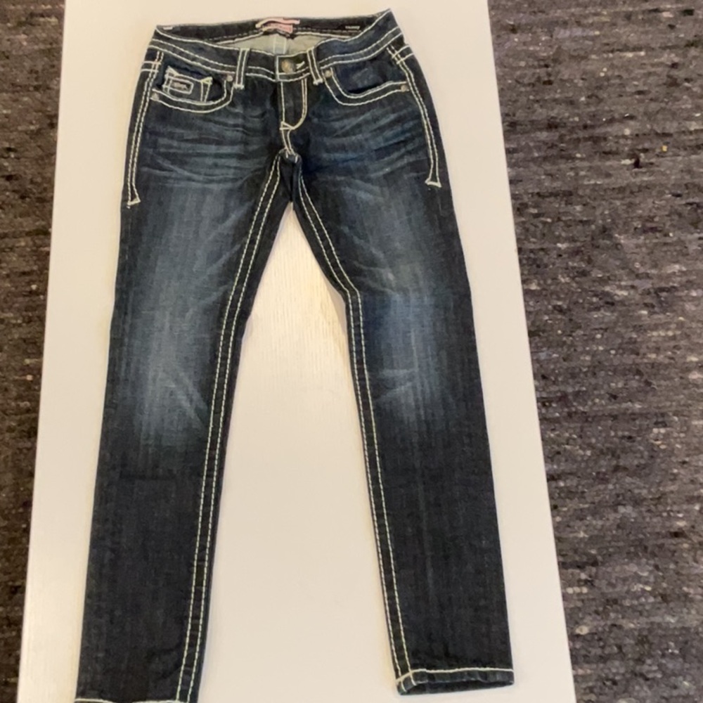 Size small skinny jeans 14 inch waist 7 inch rise in scene is 30 inches Size 26